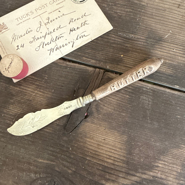 Antique Carved Handle Butter Knife