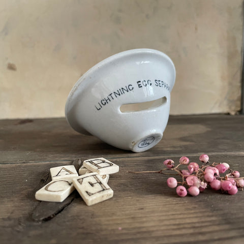 Antique Lightening Egg Separator