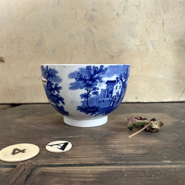 Pretty Staple Repair Antique Bowl