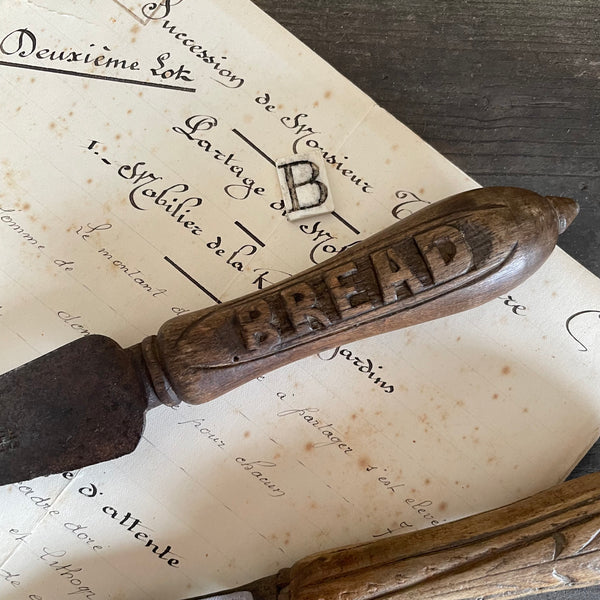 Antique Bread Carved Handle Knives