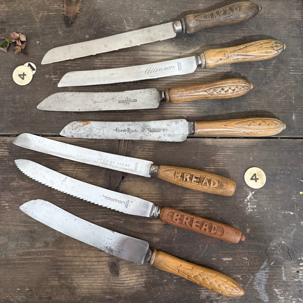 Antique Carved Handle Bread Knives