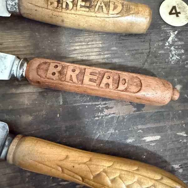 Antique Carved Handle Bread Knives