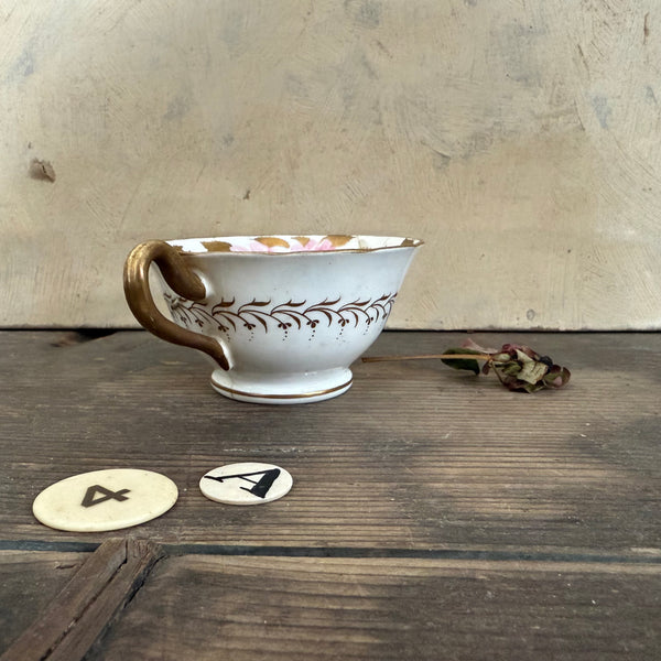 Pretty Staple Repair Antique Cup