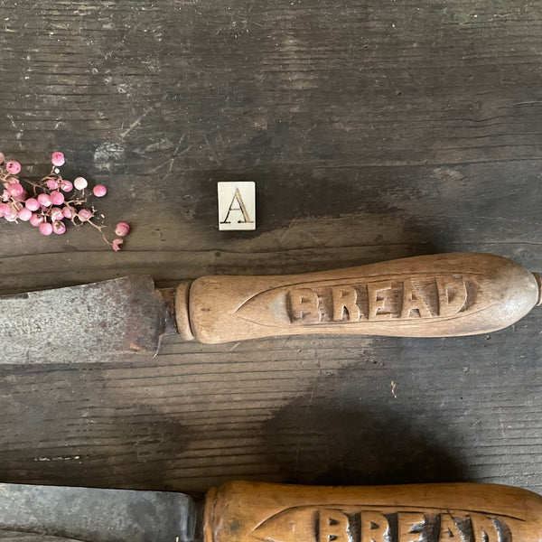 Antique Bread Carved Handle Knives