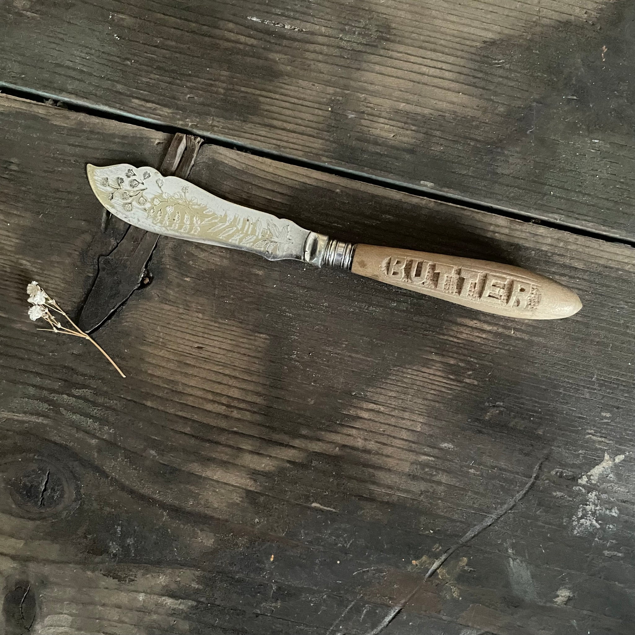 Antique Carved Handle Butter Knife