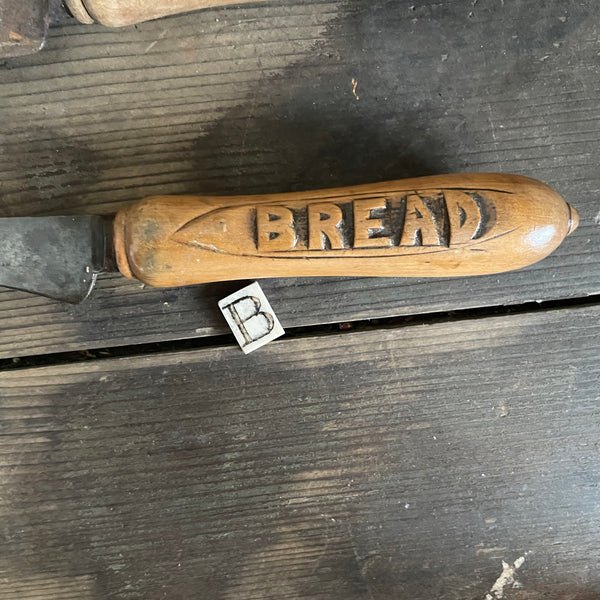 Antique Bread Carved Handle Knives