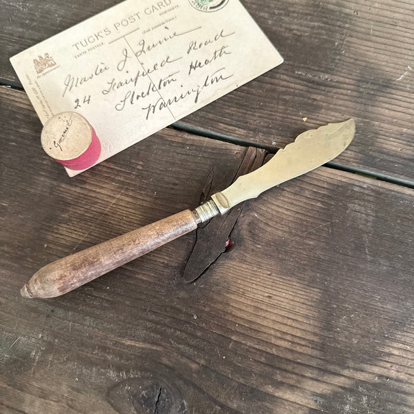 Antique Carved Handle Butter Knife