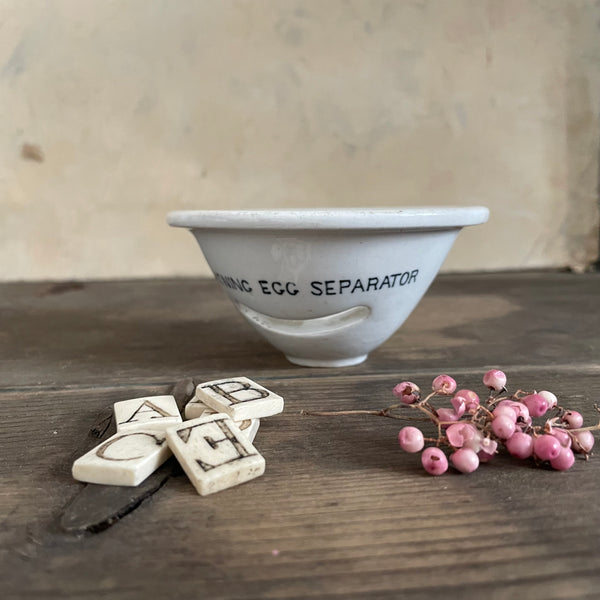Antique Lightening Egg Separator