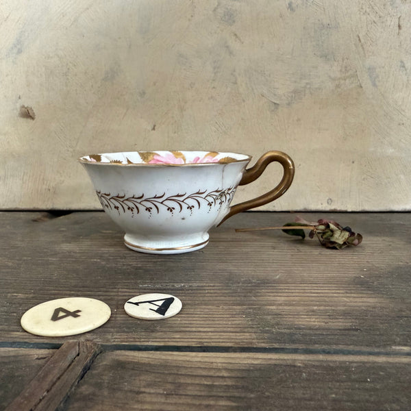 Pretty Staple Repair Antique Cup