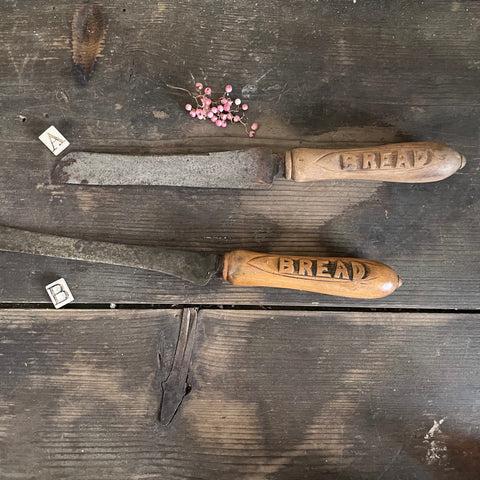 Antique Bread Carved Handle Knives