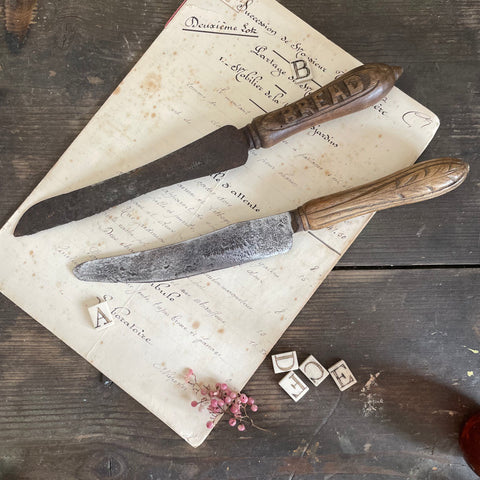 Antique Bread Carved Handle Knives