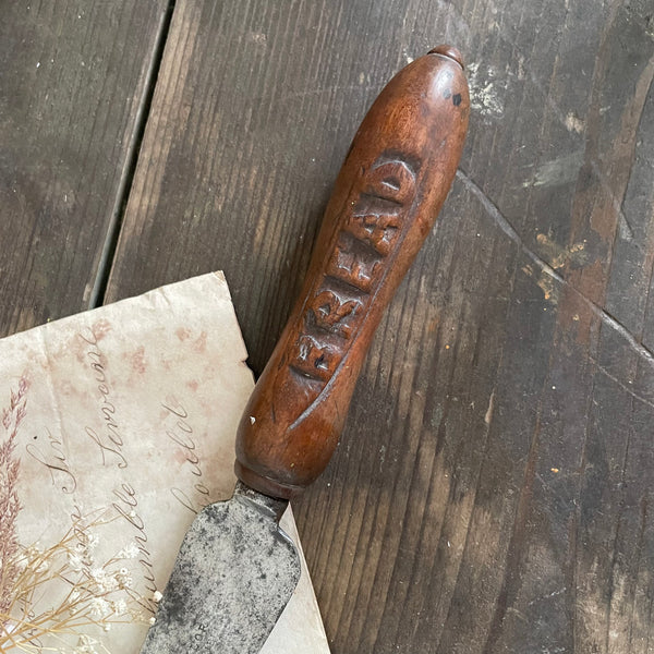 Antique Carved Handle Bread Knife