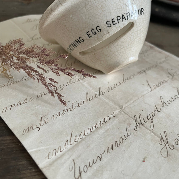 Antique Lightening Egg Separator