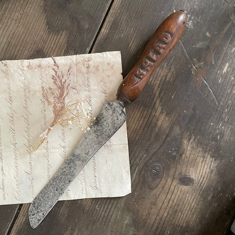 Antique Carved Handle Bread Knife