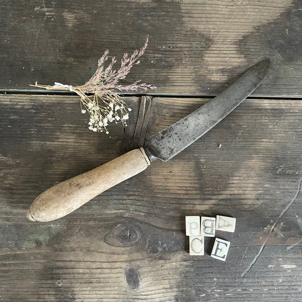 Antique Carved Handle Bread Knife