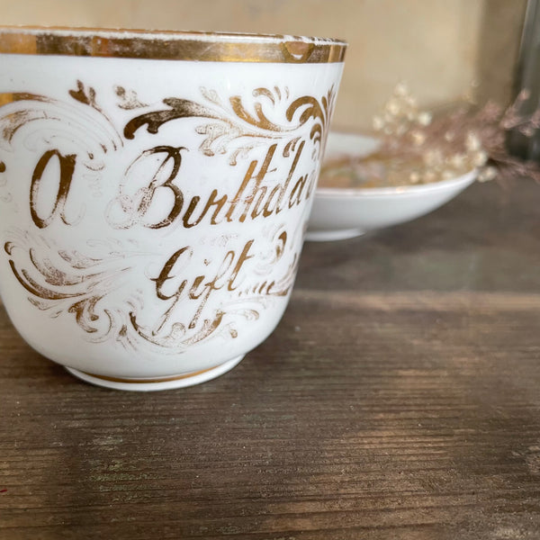 Antique 'A Birthday Gift' Tea Cup & Saucer