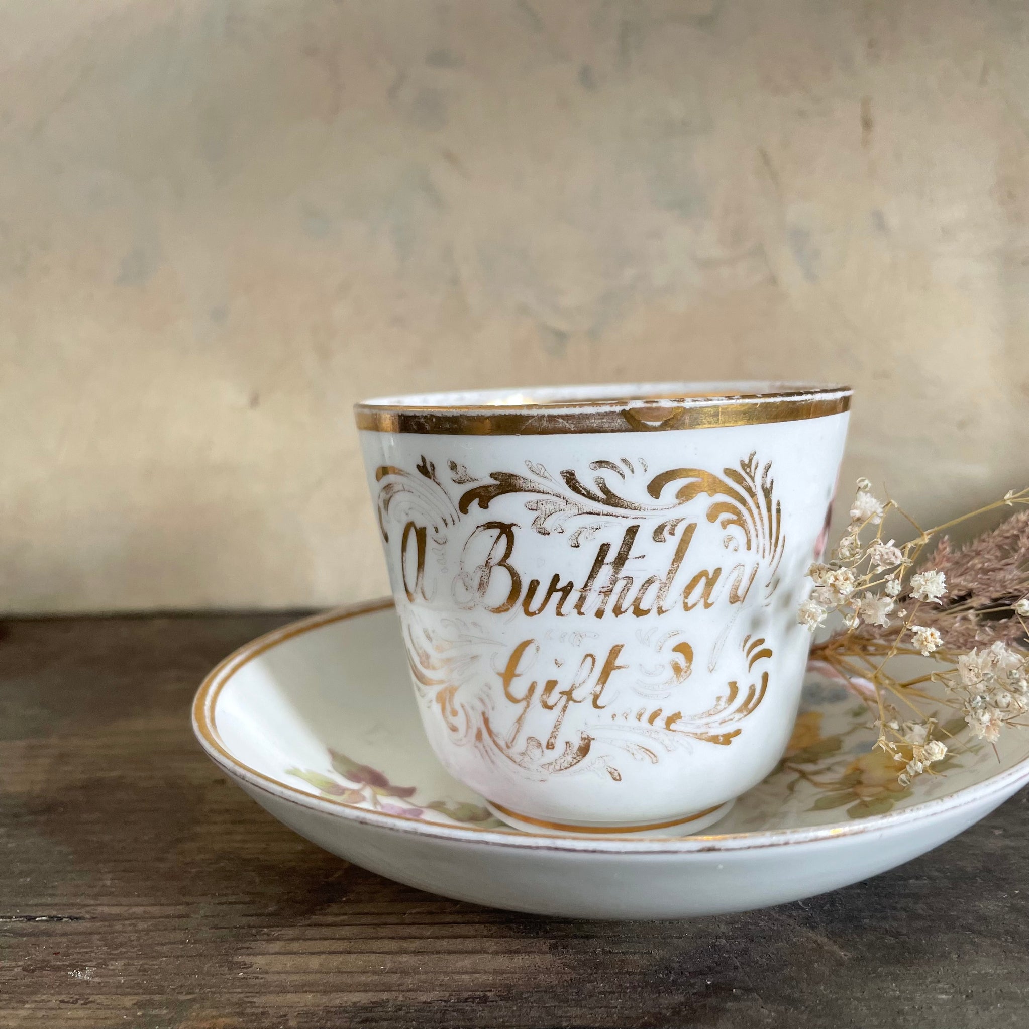 Antique 'A Birthday Gift' Tea Cup & Saucer