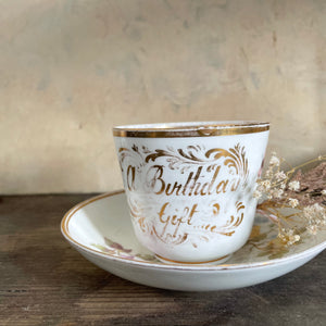 Antique 'A Birthday Gift' Tea Cup & Saucer