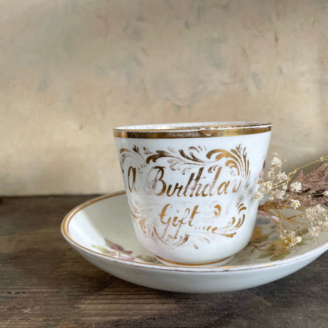 Antique 'A Birthday Gift' Tea Cup & Saucer