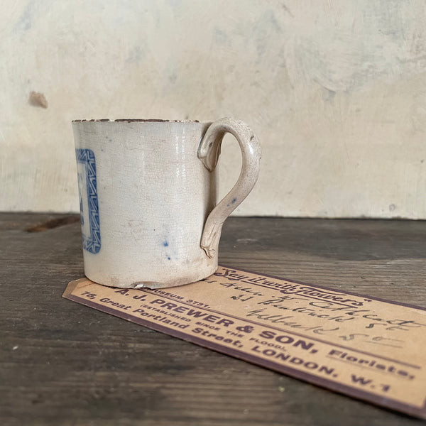 Antique Motto Cup