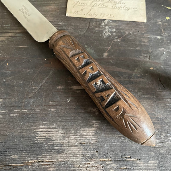 Antique Carved Handle Bread Knife