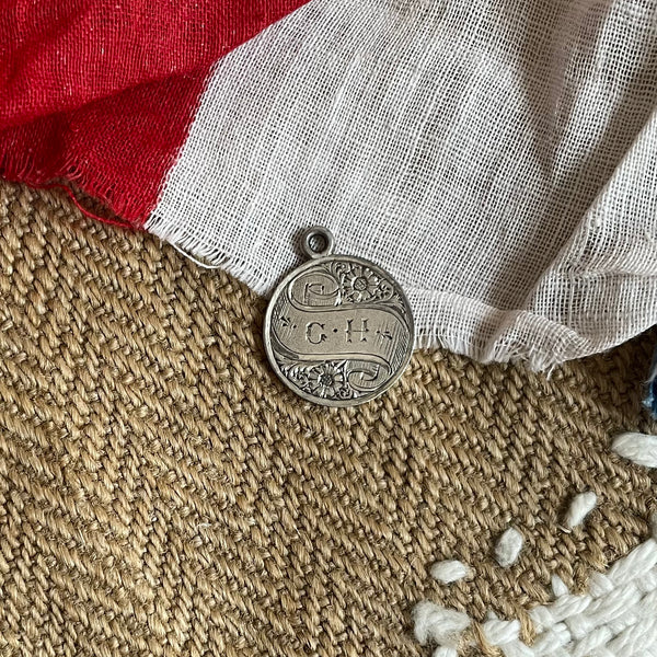 G.H on a Scroll Love Token