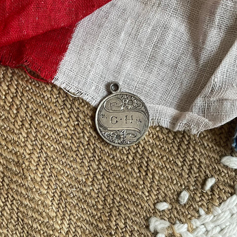 G.H on a Scroll Love Token