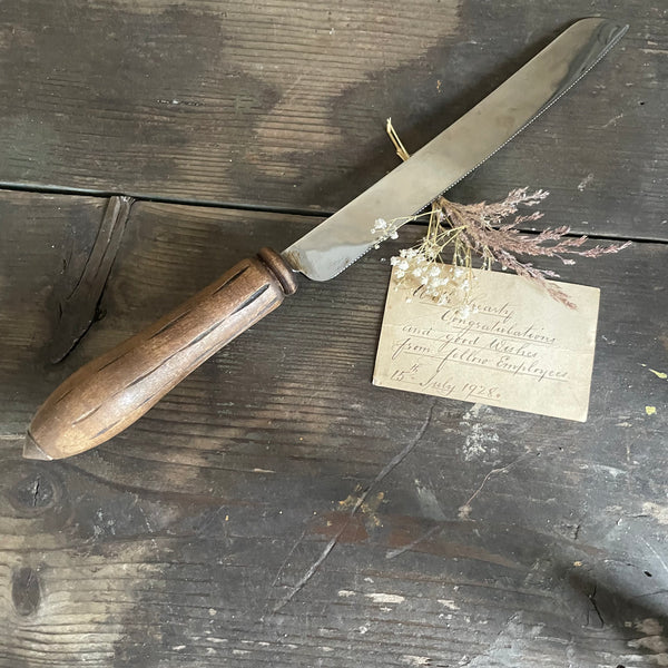 Antique Carved Handle Bread Knife